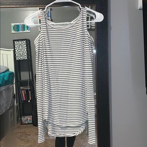 A long sleeve shirt with the shoulders cut out.